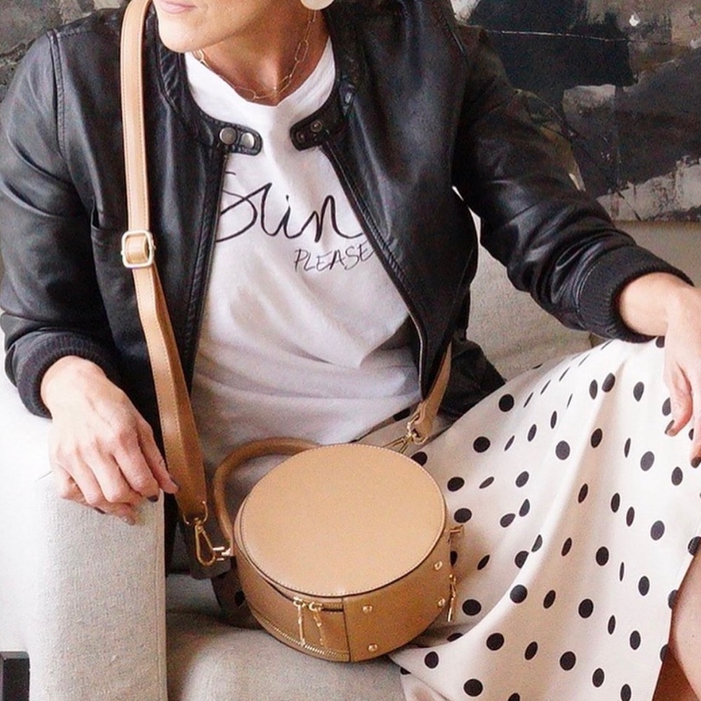 Beige vegan leather round cross body bag
